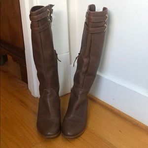 Tall brown leather boots